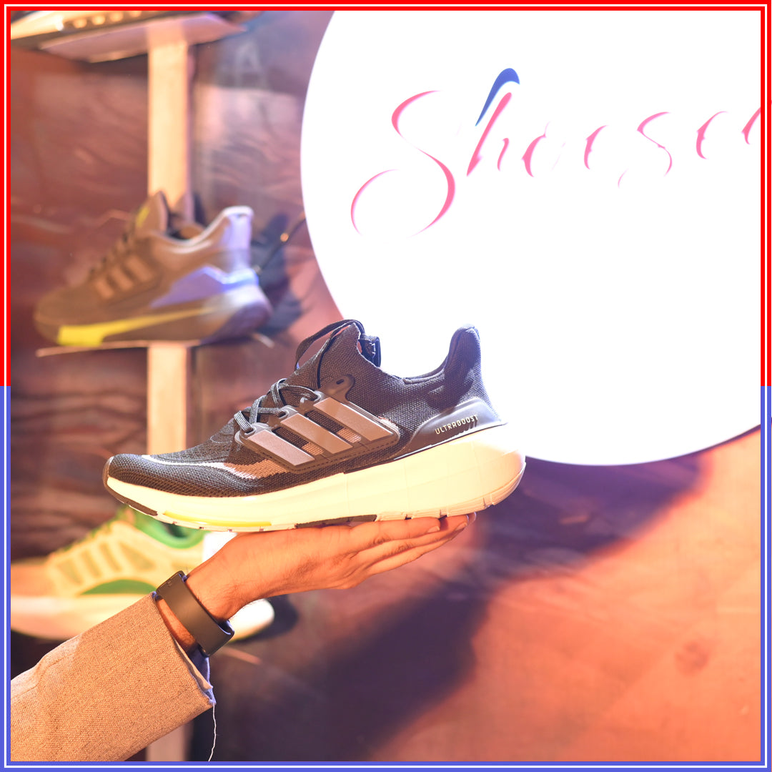 Adidas Ultraboost 5 running shoes.